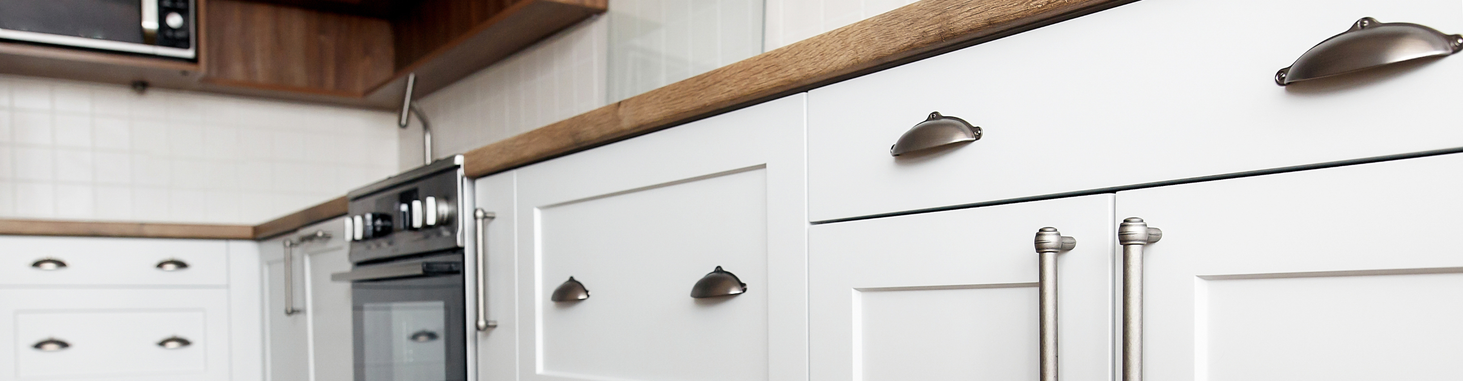 White kitchen cabinets closeup. 
